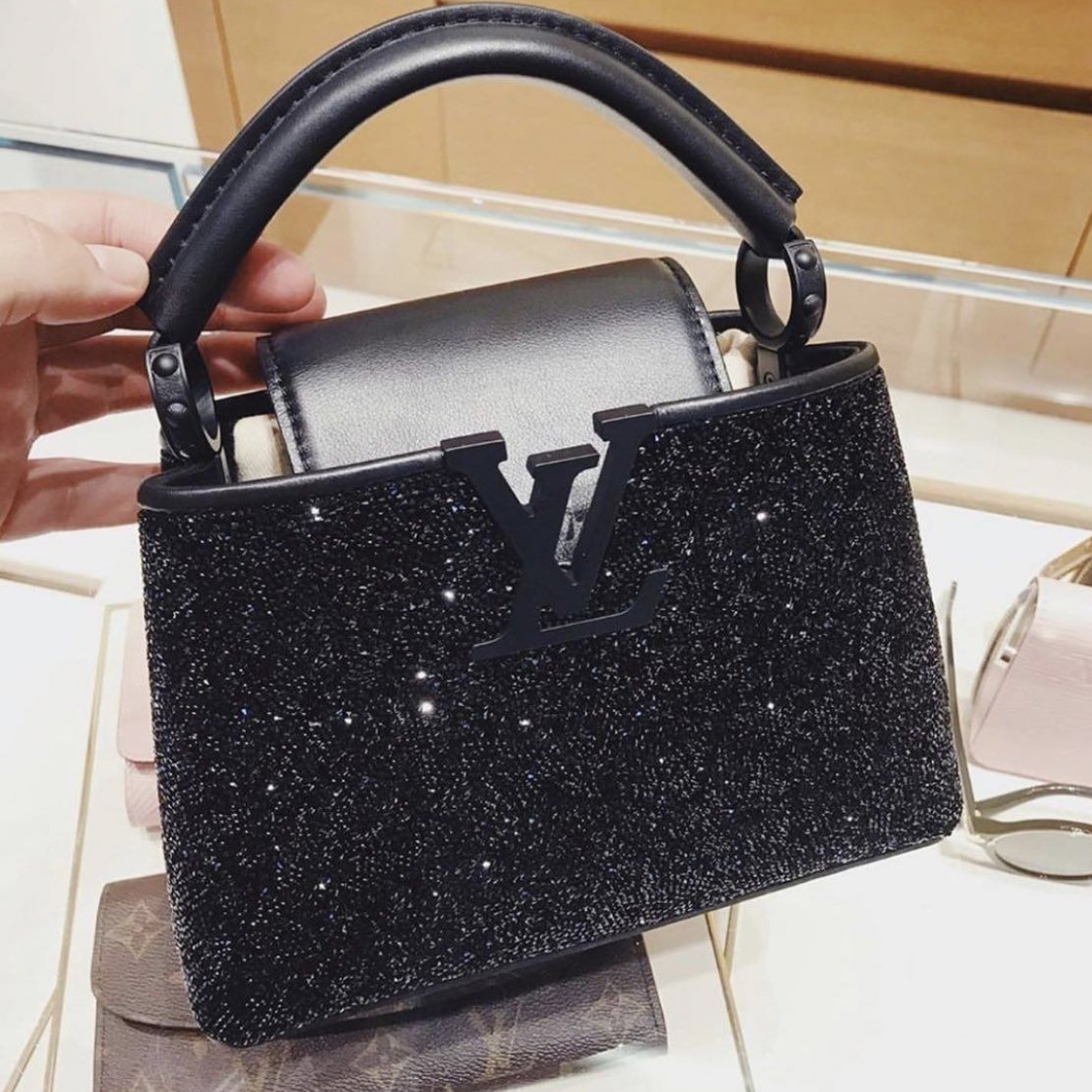 LOUIS VUITTON CAPUCINES MINI-CARTERA