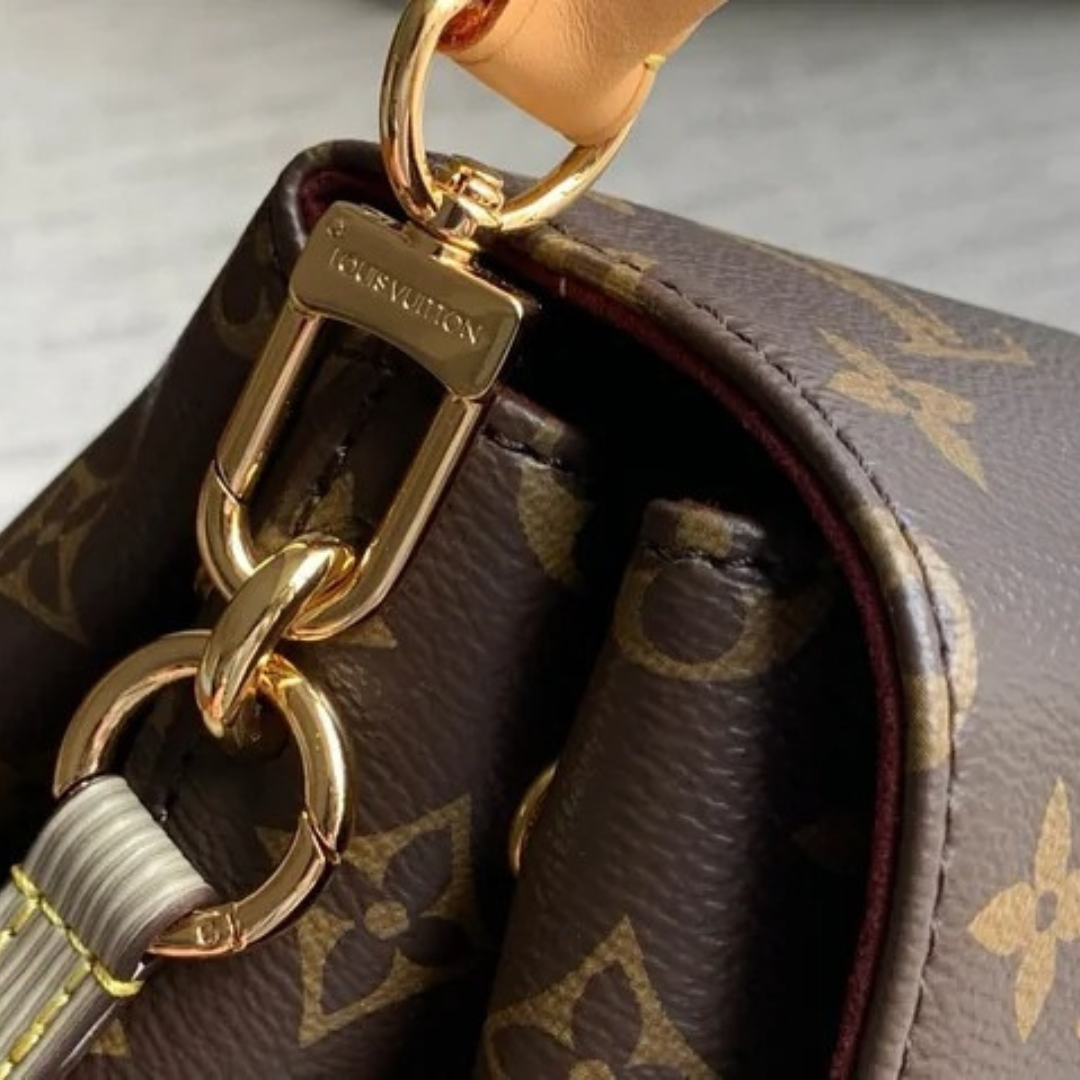 LOUIS VUITTON – HIDE AWAY MM CARTERA