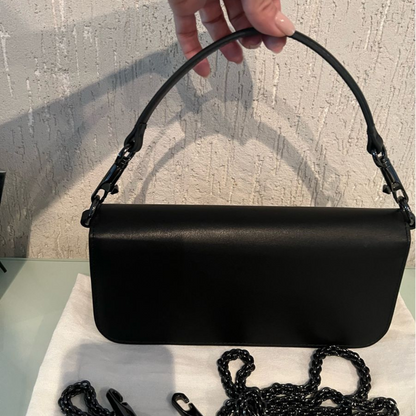 VALENTINO GARAVANI LOCÒ CHICA CARTERA DE HOMBRO CON SCHMUCKLOGO