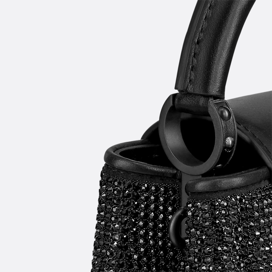 LOUIS VUITTON CAPUCINES MINI-CARTERA