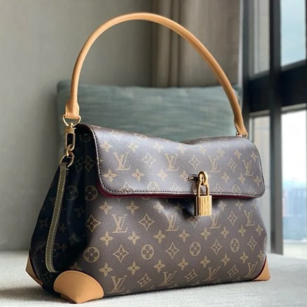 LOUIS VUITTON – HIDE AWAY MM CARTERA