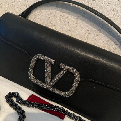 VALENTINO GARAVANI LOCÒ CHICA CARTERA DE HOMBRO CON SCHMUCKLOGO