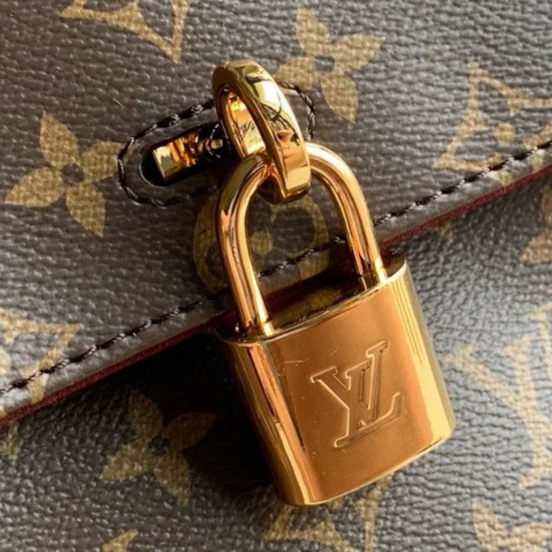 LOUIS VUITTON – HIDE AWAY MM CARTERA
