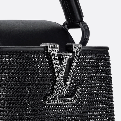 LOUIS VUITTON CAPUCINES MINI-CARTERA