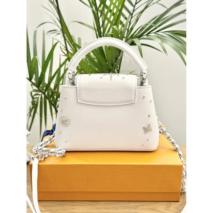 LOUIS VUITTON CAPUCINES MINI-CARTERA