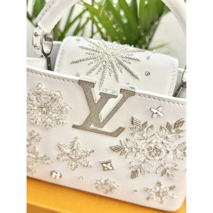LOUIS VUITTON CAPUCINES MINI-CARTERA