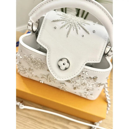 LOUIS VUITTON CAPUCINES MINI-CARTERA