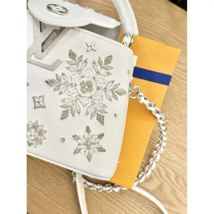 LOUIS VUITTON CAPUCINES MINI-CARTERA