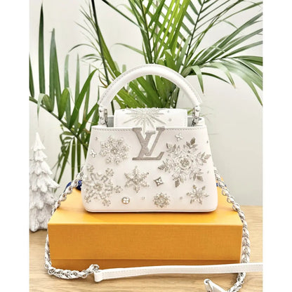 LOUIS VUITTON CAPUCINES MINI-CARTERA