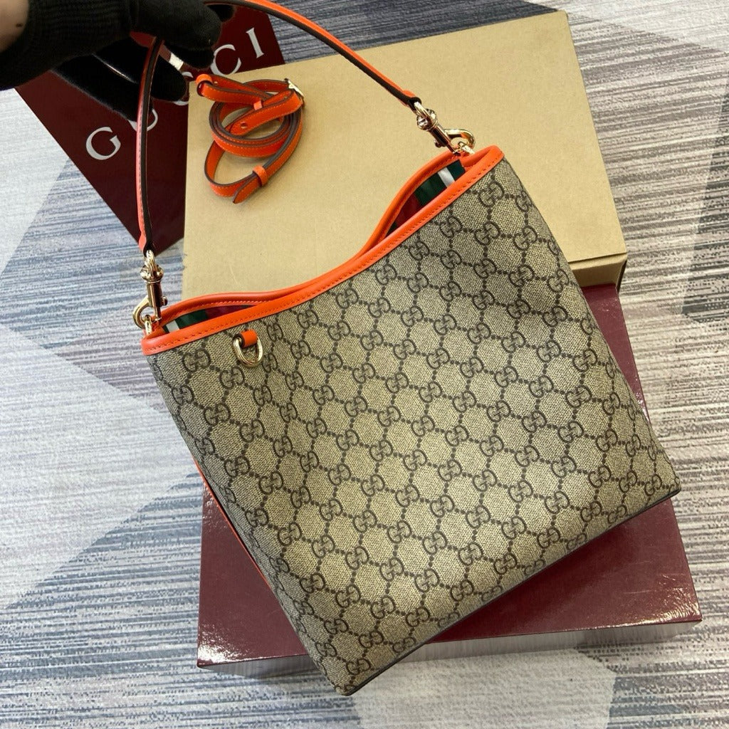 MEDIANA GG-EMBLEM-BOLSO TIPO MARSUPIO GUCCI